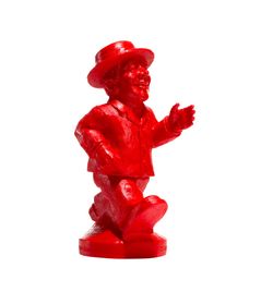 Red statue of a cheerful man.