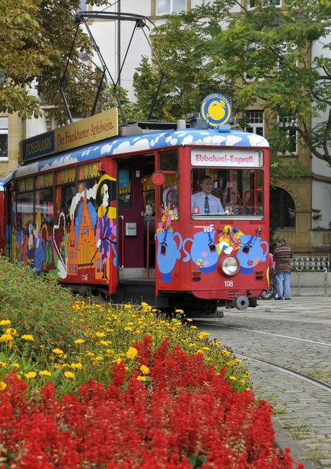 Historic tram Ebbelwei Express with flowers